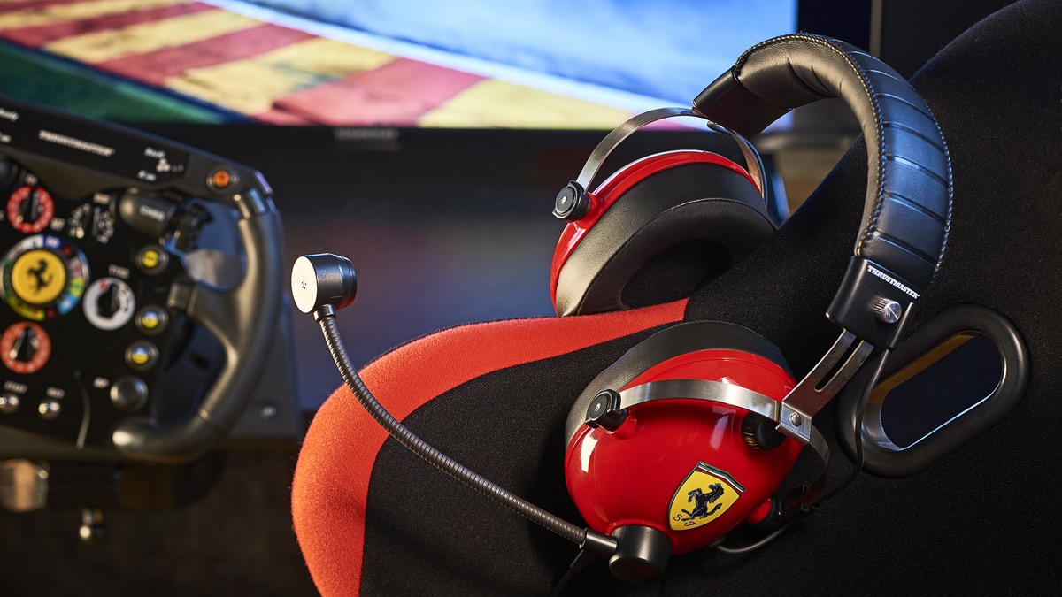 Thrustmaster Ferrari ecosystem — F1 wheel rim and T.Racing headset on a sim rig